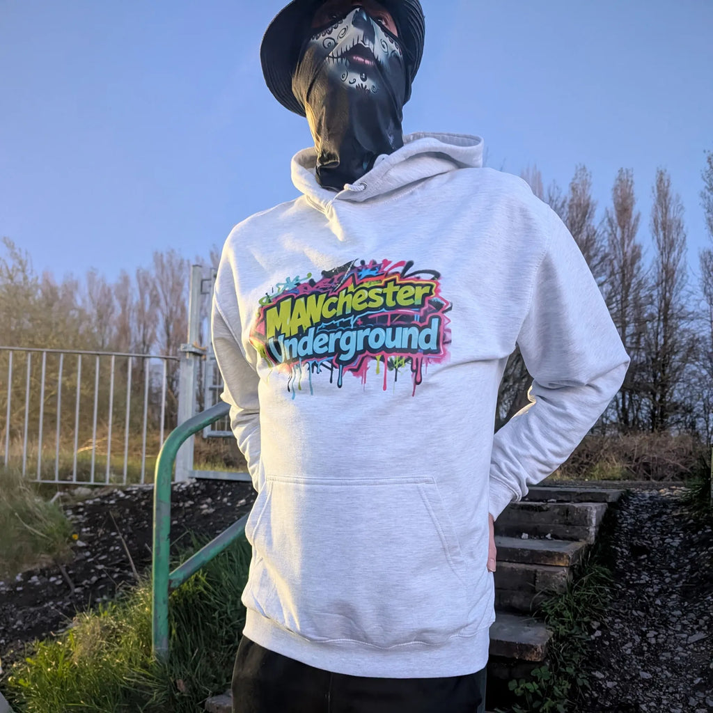 The Spirit Walker wearing Manchester Underground Ash Hoodie ash Manchester street location