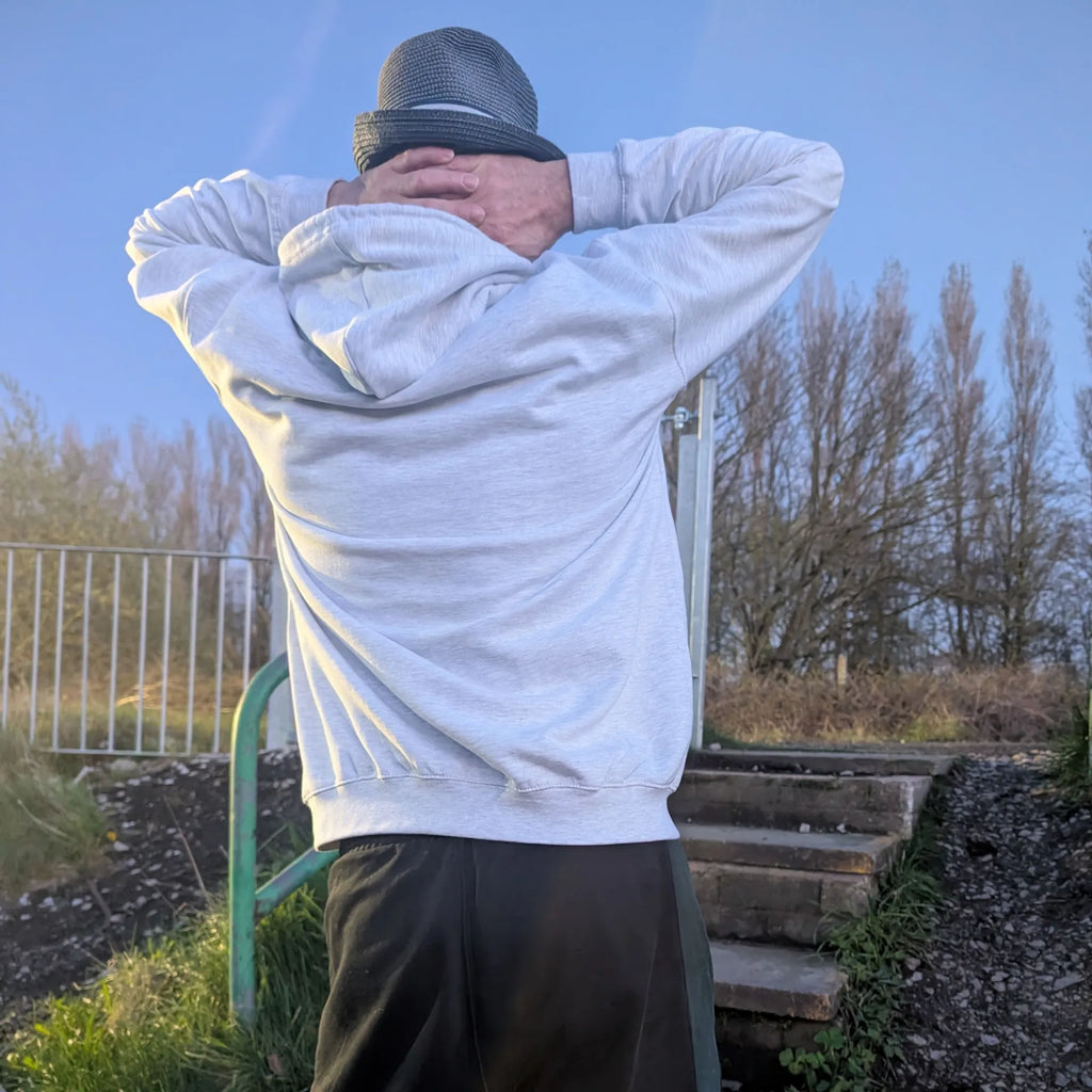 The Spirit Walker wearing Manchester Underground Ash Hoodie ash Manchester street location