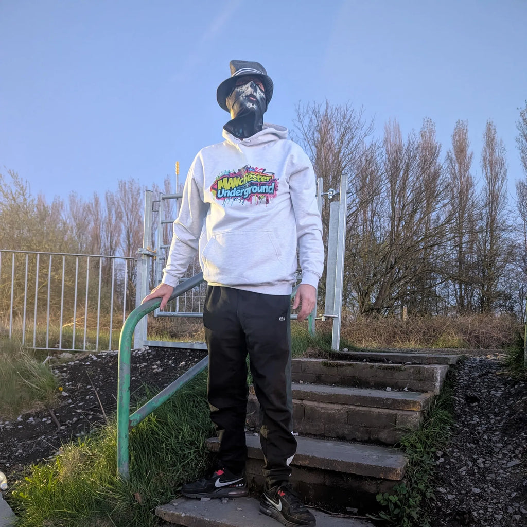 The Spirit Walker wearing Manchester Underground Ash Hoodie ash Manchester street location